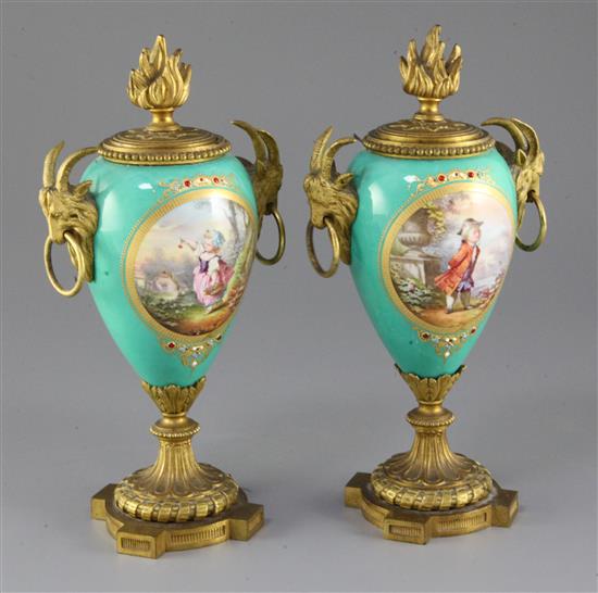 A pair of 19th century French ormolu mounted Sevres style jewelled porcelain cassoulets, height 9in.